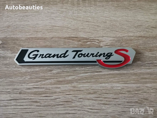 Емблема Toyota Grand Touring S