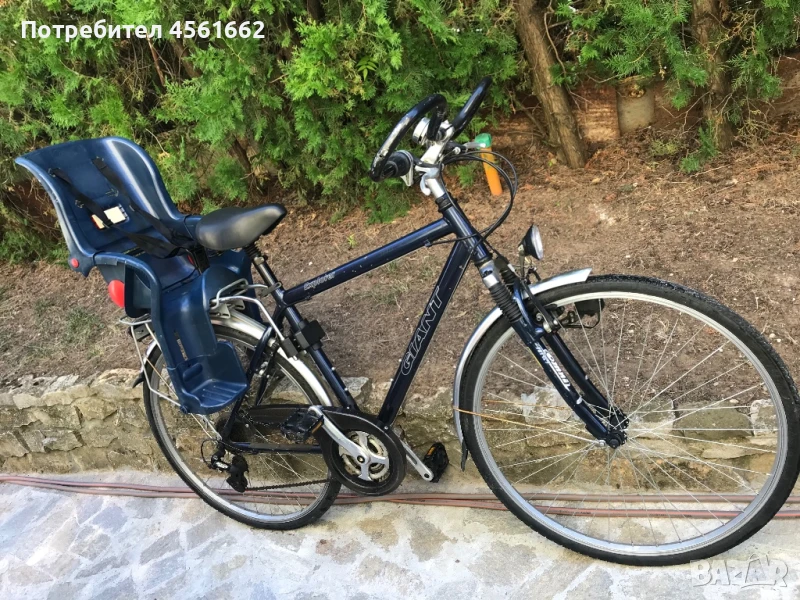 Продавам велосипед с детска седалка( столче), снимка 1