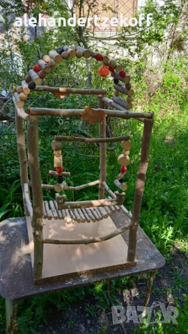 Кацалка за папагал с люлка