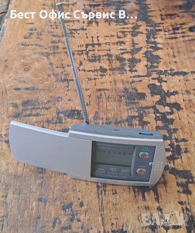 радио транзистор с часовник аларма плъзгащо се мазно, снимка 2 - Радиокасетофони, транзистори - 52063473