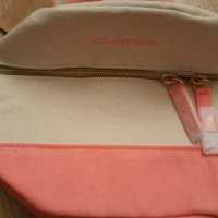 Чисто нова с етикет малка чантичка от Англия на фирмата Clarins , снимка 1 - Чанти - 31050190