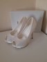 Бели елегантни обувки, снимка 1 - Дамски елегантни обувки - 29879247