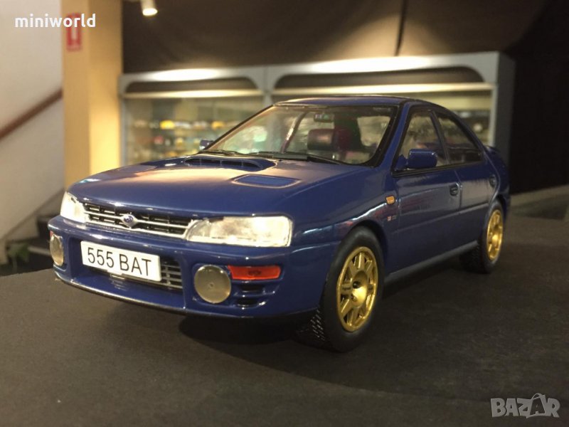 Subaru Impreza WRC - мащаб 1:18 на IXO модела е нов в не разпечатана PVC дисплей-кейс, снимка 1