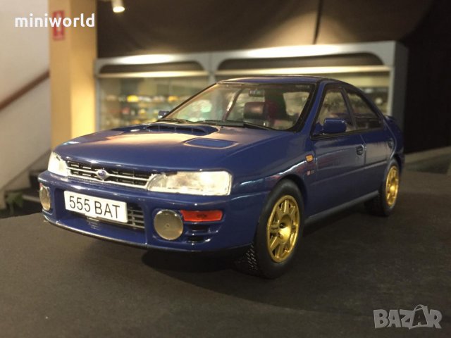Subaru Impreza WRC - мащаб 1:18 на IXO модела е нов в не разпечатана PVC дисплей-кейс