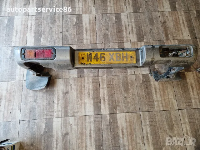 Isuzu Trooper 2006 година задна броня сив цвят здрава 