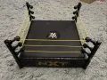Ринг за играчки WWE NXT Action Spring Ring Wrestling кеч ринг с пружиниращ механизъм черен, снимка 11