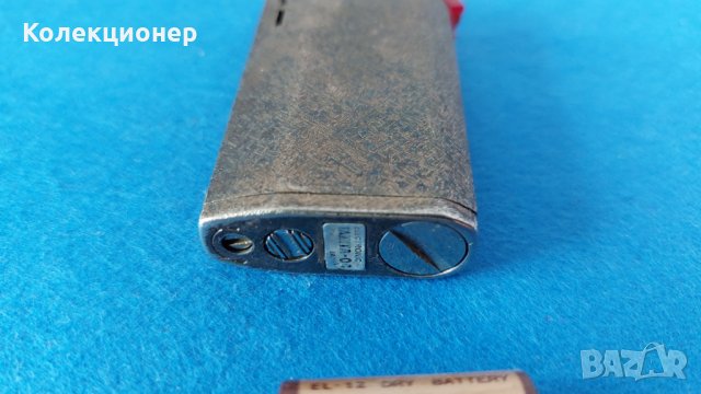 Рядка, посребрена, за колекционери запалка Tanita-04 с оргиналната си батерия, снимка 2 - Запалки - 35272385