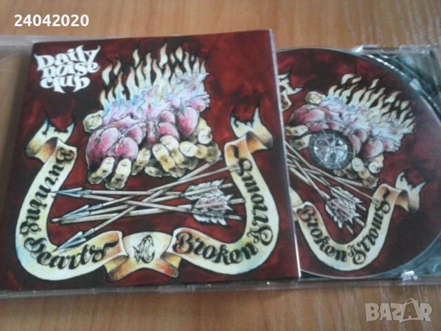 Daily Noise Club – Burning Hearts Broken Arrows оригинален диск