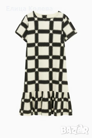 Нова рокля в черно и бяло, от немачкаема материя, със странични джобове,  размер М