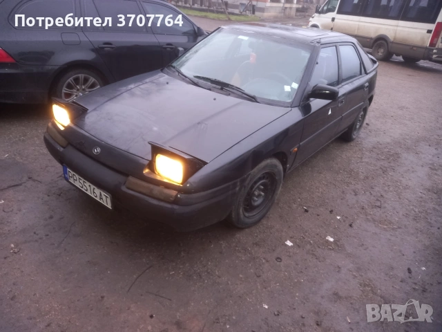 МАЗДА323F