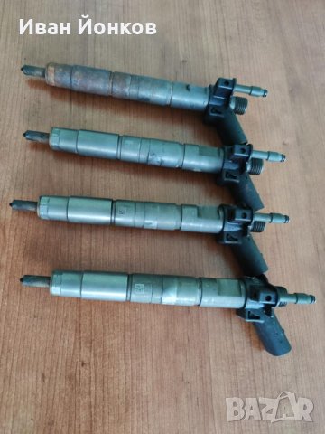 Дюзи с помпа за БМВ Е 90/91 - 7797877-05, снимка 2 - Части - 37672207