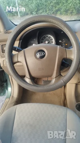 Kia Sportige 2006г., снимка 13 - Автомобили и джипове - 56024825