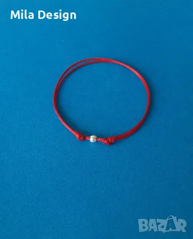 Гривна червен конец със сребърно топче
