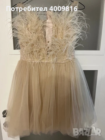 Елегантна рокля без ръкави и със пера в областта на деколтето. Марка Junona, снимка 1