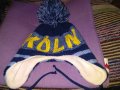 Зимна шапка с пискюл и вързанки на Кьолн