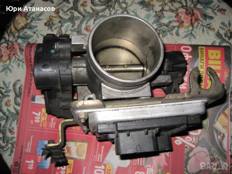 Дроселова клапа, снимка 1