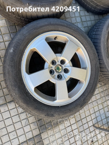 Оригинални джанти за Шкода 16 цола 5х100 със зимни гуми, снимка 2 - Гуми и джанти - 52429816