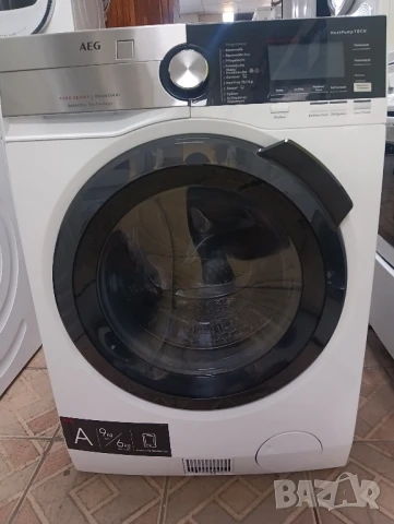 Пералня със сушилня с термопомпа АЕГ Aeg с две години гаранция!, снимка 1