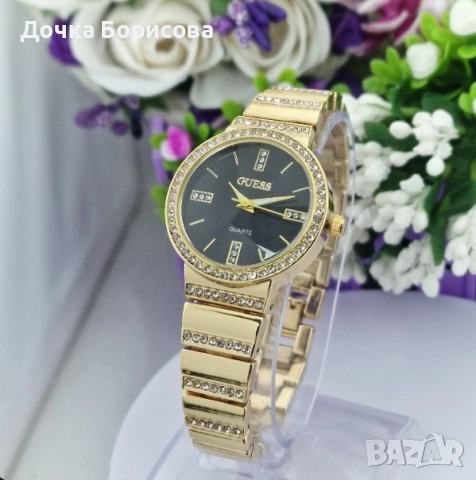 Дамски часовник Guess - златист с черен циферблат 