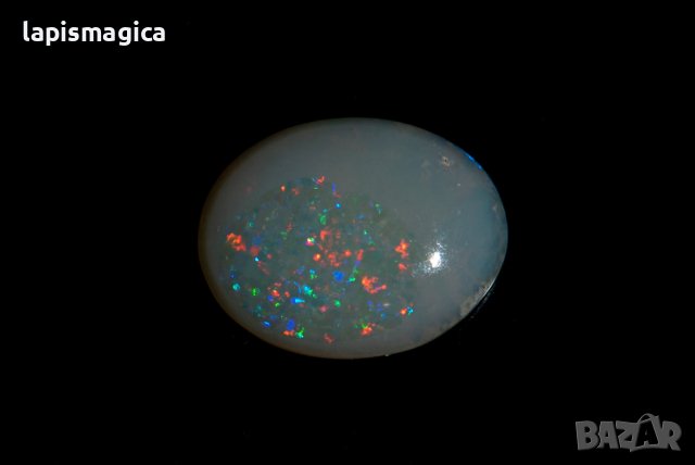 Австралийски кристален опал 0.98ct овален кабошон, снимка 3 - Други - 42909337