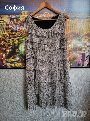 Елегантна рокля с къдрички