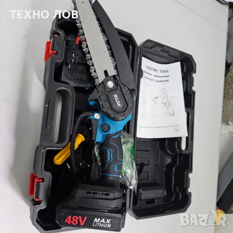 Акумулаторна резачка за дърва и клони с 2 литиевойонни батерии-48v с и 2 вериги

