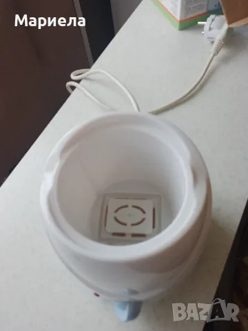 Нагревател за  затопляне на мляко и пюрета, снимка 2 - Прибори, съдове, шишета и биберони - 48491342