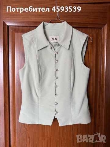 Официален дамски костюм