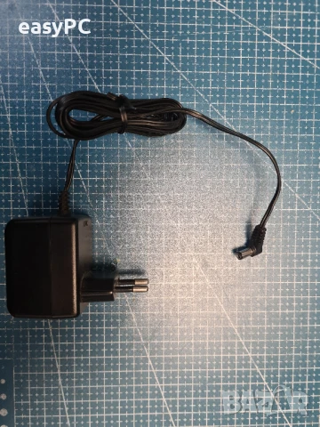Оригинален захранващ адаптер AC-AC C39280-Z4-C501/SNG 30-a A5B00075030292 9.5V~400mA , снимка 3 - Друга електроника - 50699683