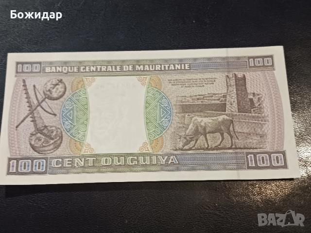 100 Угия.2002г. Мавритания., снимка 2 - Нумизматика и бонистика - 52645729