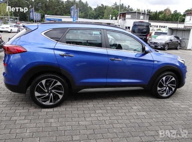 Hyundai Tucson Premium* Панорама* Обдухване* 4WD* Сервизна Истори

, снимка 2 - Автомобили и джипове - 53271293