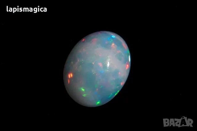 Етиопски опал 0.86ct овален кабошон, снимка 3 - Други - 48310495