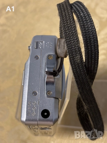 KONICA MINOLTA DIMAGE X50, снимка 7 - Фотоапарати - 52466694