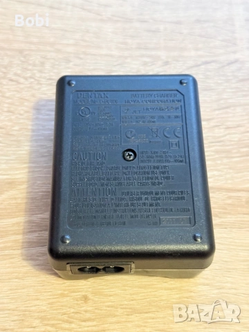  Pentax D-BC109 зарядно, снимка 2 - Батерии, зарядни - 53889816