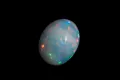 Етиопски опал 0.86ct овален кабошон, снимка 3