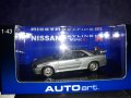 NISSAN  SKYLINE GT-R,R-34 V-spec // AUTOart. 1.43 . Top Model.!!!, снимка 1 - Колекции - 39258739