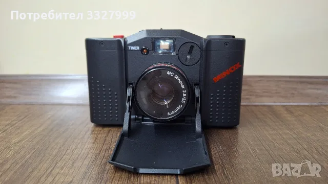 Minox 35 GT-E, забележителен 35-милиметров компактен филмов фотоапарат. 