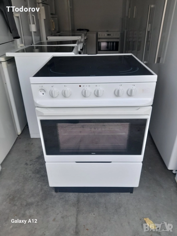 Готварска печка с керамичен плот и фурна с вентилатор, снимка 1