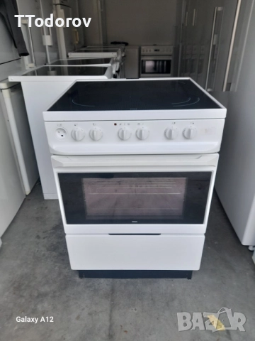 Готварска печка с керамичен плот и фурна с вентилатор