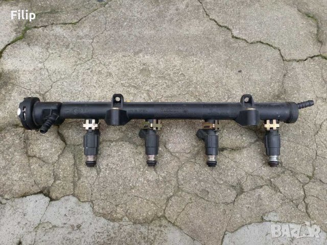 Рейка с дюзи и регулатор за налягане на горивото