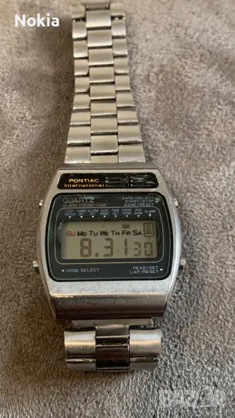 PONTIAC international  QUARTZ  DATE/SELECT  ALARM-CHRONO-GAME  STOP  START/STOP  GAME/RESET  , снимка 1