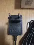 Захранващ адаптер модел J151-1801000EX с изходно напрежение 18.0V и ток 1.0A, снимка 2