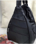 Модерна дамска черна раница с ципове от естествена кожа., снимка 1 - Раници - 44514262