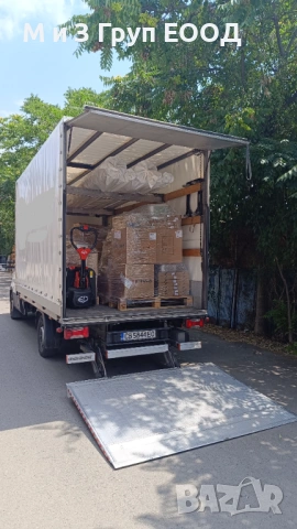 Транспортни услуги с бус с падащ борд.