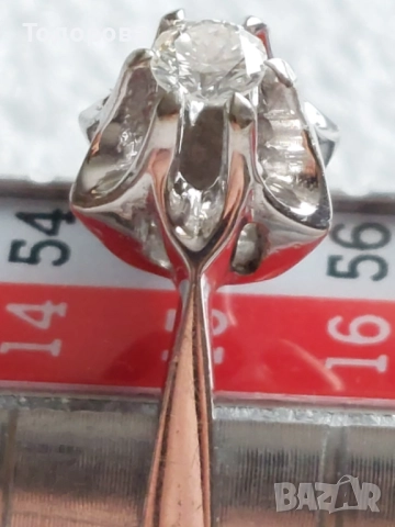 Дамски златен пръстен с инкрустиран диамант 0.20 карата,бяло злато проба 750, снимка 11 - Пръстени - 52592247
