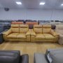 Два оранжеви кожени дивана двойки - естествена кожа, снимка 1 - Дивани и мека мебел - 39974030