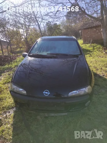 продавам Опел тигра на части , снимка 1