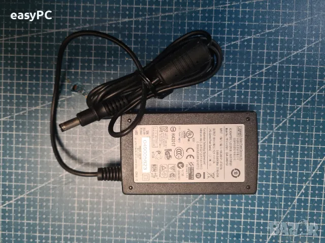 Оригинален захранващ адаптер APD DA-24D12 12V 2A 24W, снимка 2 - Друга електроника - 49097908