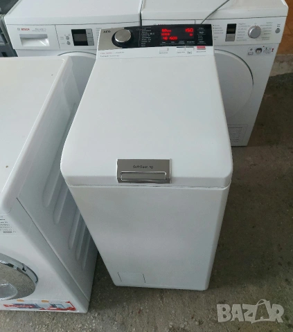 Пералня AEG 7000 с горно зареждане