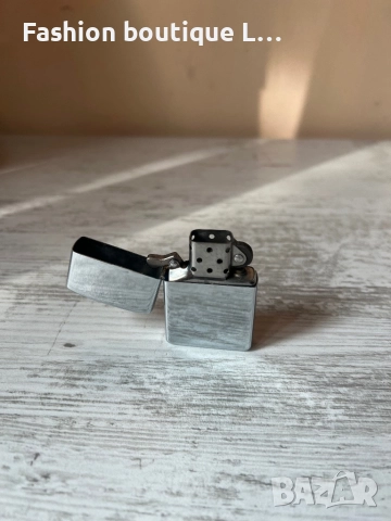 Сребърна запалка на бензин работи,но трябва да се зареди.